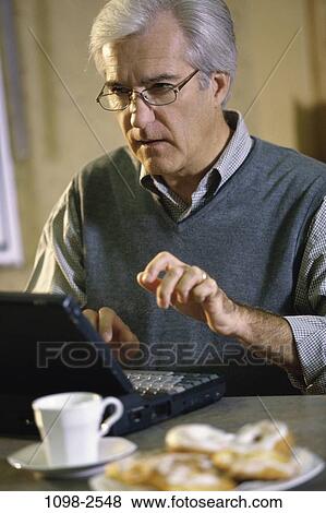 people, home, technology, senior, computer, laptop View Large Photo Image Stock Photo - people, home, technology, senior, computer, laptop. Fotosearch