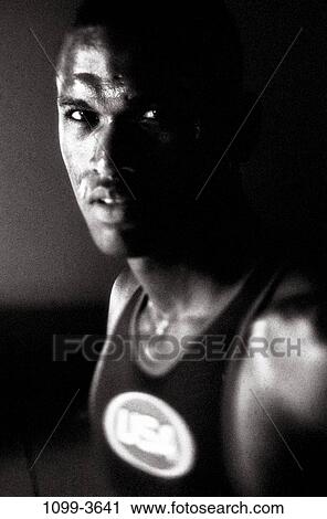 people, intense, serious, T-shirt, USA, indoors View Large Photo Image Stock Image - people, intense, serious, T-shirt, USA, indoors. Fotosearch