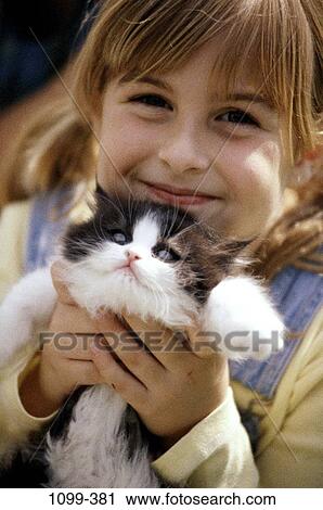 people, kitten, cat, pet, girl, outdoors, Caucasian View Large Photo Image Stock Image - people, kitten, cat, pet, girl, outdoors, Caucasian. Fotosearch