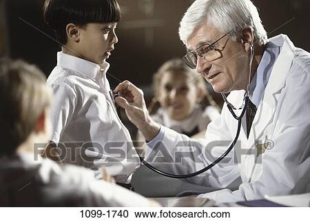 Stock Image - people, listening, school, classroom, doctor, stethoscope. Fotosearch