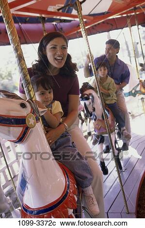 Stock Image - people, outdoors, family, parents, outing, Families outdoors activity. Fotosearch