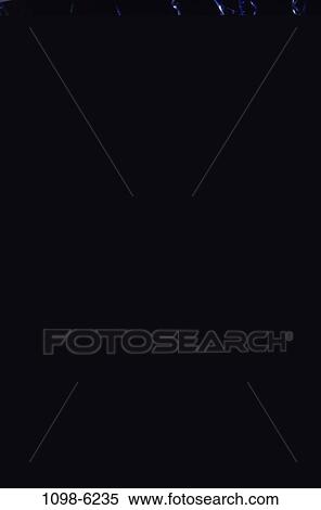 Stock Photography - people, party, couple, dancing, serious, nightlife, streamers. Fotosearch
