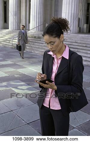 people, planner, eyeglasses, computer, outdoors, device, portable View Large Photo Image Stock Photo - people, planner, eyeglasses, computer, outdoors, device, portable. Fotosearch