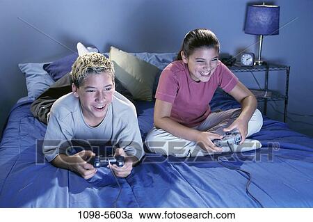people, playing, play, game, teens, video, video game View Large Photo Image Stock Image - people, playing, play, game, teens, video, video game. Fotosearch