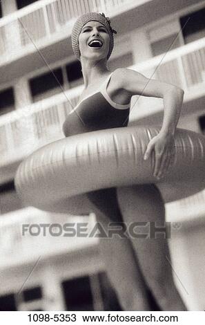 people, pool, woman, inner tube, outdoors, cap, joyous View Large Photo Image Stock Image - people, pool, woman, inner tube, outdoors, cap, joyous. Fotosearch