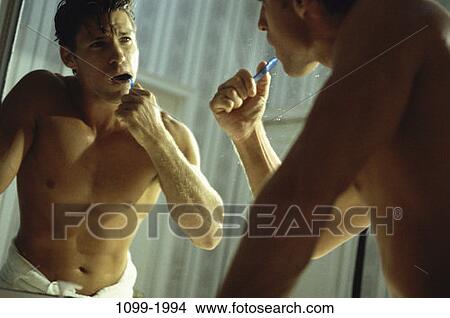 people, reflection, teeth, brushing, mirror, reflecting View Large Photo Image Picture - people, reflection, teeth, brushing, mirror, reflecting. Fotosearch