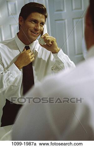 people, reflection, tie, telephone, talking, phone View Large Photo Image Stock Image - people, reflection, tie, telephone, talking, phone. Fotosearch
