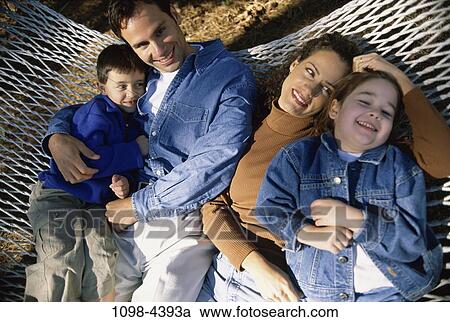 people, relaxation, autumn, hammock, outdoors, tranquility, relaxing View Large Photo Image Stock Image - people, relaxation, autumn, hammock, outdoors, tranquility, relaxing. Fotosearch