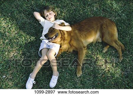 people, relaxation, dog, pet, girl, outdoors, relaxing View Large Photo Image Stock Photo - people, relaxation, dog, pet, girl, outdoors, relaxing. Fotosearch