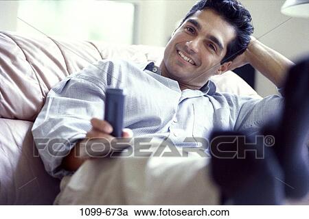 people, relaxation, Hispanic, watch, relaxing, watching View Large Photo Image Stock Image - people, relaxation, Hispanic, watch, relaxing, watching. Fotosearch