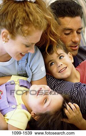 people, relaxation, smiling, laughing, relaxing, joyous, smile View Large Photo Image Stock Photo - people, relaxation, smiling, laughing, relaxing, joyous, smile. Fotosearch