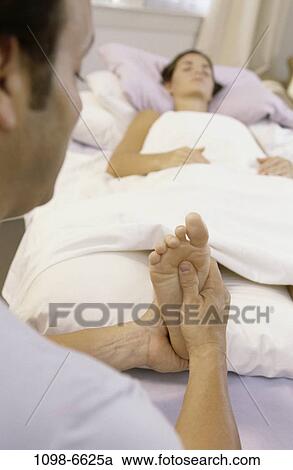 Stock Image - people, relaxation, woman, couple, relaxing, brunette. Fotosearch