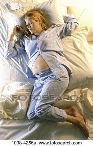 people, relaxation, woman, sleeping, bed, stomach, Middle-aged View Large Photo Image Stock Image - people, relaxation, woman, sleeping, bed, stomach, Middle-aged. Fotosearch