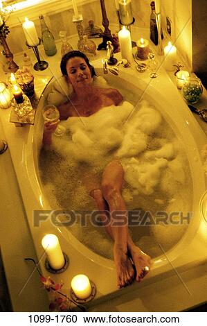 people, relaxation, woman, wine, bubbles, tranquility, Middle-aged View Large Photo Image Stock Image - people, relaxation, woman, wine, bubbles, tranquility, Middle-aged. Fotosearch