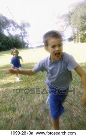 Stock Image - people, running, playing, motion, outdoors, park, children. Fotosearch