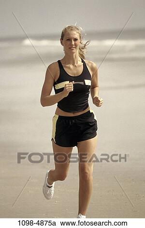 people, running, woman, smiling, healthy, beach, jogging View Large Photo Image Stock Image - people, running, woman, smiling, healthy, beach, jogging. Fotosearch