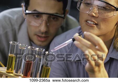 Stock Image - people, school, studying, testing, research, goggles, friends. Fotosearch