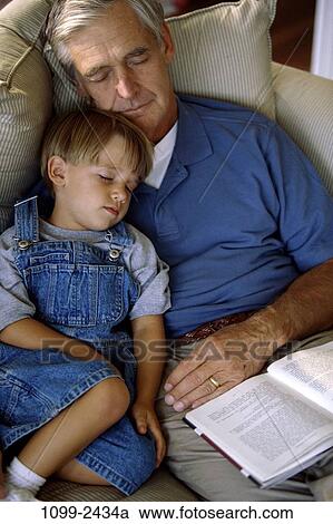 people, sleeping, couch, book, nestle, family, cuddling View Large Photo Image Stock Image - people, sleeping, couch, book, nestle, family, cuddling. Fotosearch