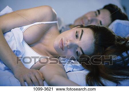 people, sleeping, couple, Hispanic, bed, Middle-aged, contemplation View Large Photo Image Stock Image - people, sleeping, couple, Hispanic, bed, Middle-aged, contemplation. Fotosearch