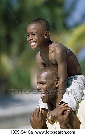 people, smiling, beach, riding, carrying, joyous, smile View Large Photo Image Stock Image - people, smiling, beach, riding, carrying, joyous, smile. Fotosearch