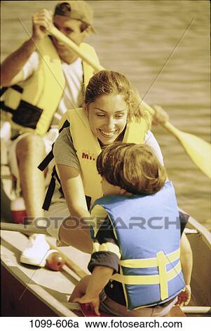 people, smiling, boating, outdoors, boat, paddling, rowing View Large Photo Image Stock Image - people, smiling, boating, outdoors, boat, paddling, rowing. Fotosearch