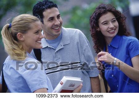 people, smiling, book, holding, outdoors, friends View Large Photo Image Stock Image - people, smiling, book, holding, outdoors, friends. Fotosearch