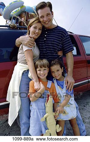 people, smiling, car, luggage, happy, outdoors, adventurous View Large Photo Image Stock Image - people, smiling, car, luggage, happy, outdoors, adventurous. Fotosearch