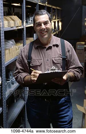 people, smiling, clipboard, worker, Middle-aged, smile View Large Photo Image Stock Image - people, smiling, clipboard, worker, Middle-aged, smile. Fotosearch