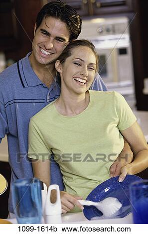 people, smiling, couple, affection, touching, kitchen, brunette View Large Photo Image Stock Image - people, smiling, couple, affection, touching, kitchen, brunette. Fotosearch