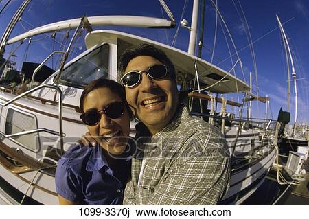 people, smiling, couple, Hispanic, laughing, sunglasses View Large Photo Image Stock Image - people, smiling, couple, Hispanic, laughing, sunglasses. Fotosearch