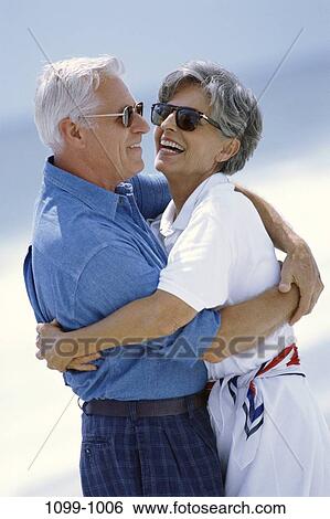 people, smiling, couple, senior, beach, laughing, sunglasses View Large Photo Image Stock Photograph - people, smiling, couple, senior, beach, laughing, sunglasses. Fotosearch