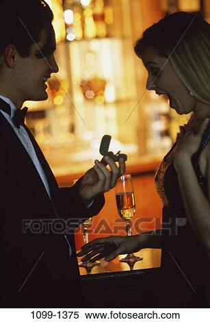 people, smiling, couple, wine, romantic, risk, jewelry View Large Photo Image Stock Photography - people, smiling, couple, wine, romantic, risk, jewelry. Fotosearch