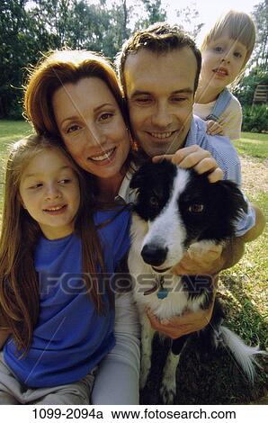 people, smiling, dog, pet, outdoors, hugging, smile View Large Photo Image Stock Image - people, smiling, dog, pet, outdoors, hugging, smile. Fotosearch