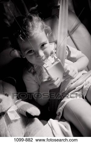 people, smiling, drinking, happy, stuffed animal, girl, transportation View Large Photo Image Stock Image - people, smiling, drinking, happy, stuffed animal, girl, transportation. Fotosearch
