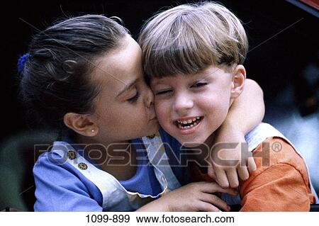 people, smiling, friendship, laughing, playful, outdoors, hugging View Large Photo Image Stock Photo - people, smiling, friendship, laughing, playful, outdoors, hugging. Fotosearch