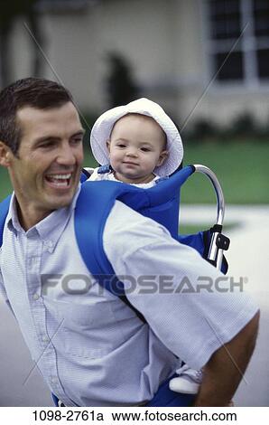 people, smiling, hat, baby, backpack, riding, back View Large Photo Image Stock Image - people, smiling, hat, baby, backpack, riding, back. Fotosearch
