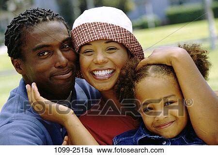 people, smiling, hat, happy, outdoors, hugging View Large Photo Image Stock Image - people, smiling, hat, happy, outdoors, hugging. Fotosearch