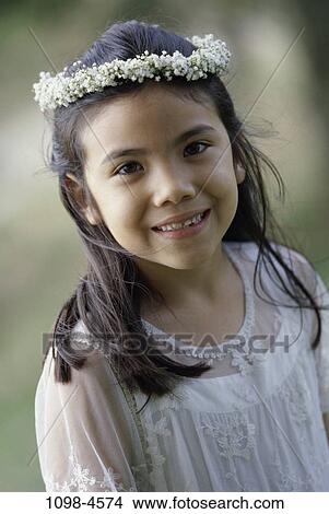 people, smiling, Hispanic, hair, girl, flower, outdoors View Large Photo Image Picture - people, smiling, Hispanic, hair, girl, flower, outdoors. Fotosearch