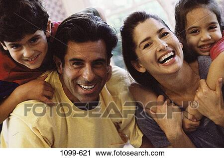 people, smiling, Hispanic, hugging, smile, family View Large Photo Image Stock Image - people, smiling, Hispanic, hugging, smile, family. Fotosearch