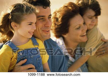 people, smiling, Hispanic, outdoors, commitment, family, overalls View Large Photo Image Stock Photo - people, smiling, Hispanic, outdoors, commitment, family, overalls. Fotosearch