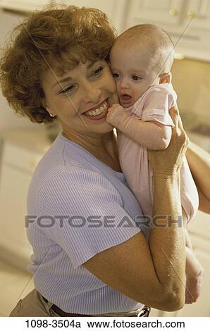 people, smiling, holding, hugging, smile, family, hug View Large Photo Image Stock Image - people, smiling, holding, hugging, smile, family, hug. Fotosearch