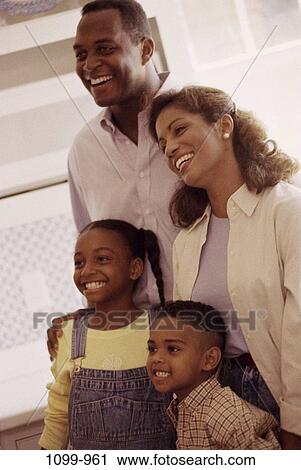 people, smiling, laughing, standing, smile, family, stand View Large Photo Image Stock Image - people, smiling, laughing, standing, smile, family, stand. Fotosearch