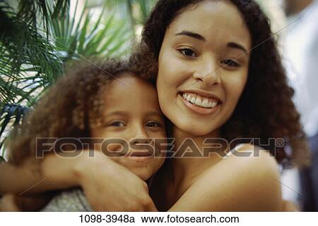 people, smiling, mother, outdoors, hugging, commitment, smile View Large Photo Image Stock Image - people, smiling, mother, outdoors, hugging, commitment, smile. Fotosearch