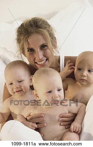 people, smiling, mother, smile, family, babies, portrait View Large Photo Image Stock Image - people, smiling, mother, smile, family, babies, portrait. Fotosearch