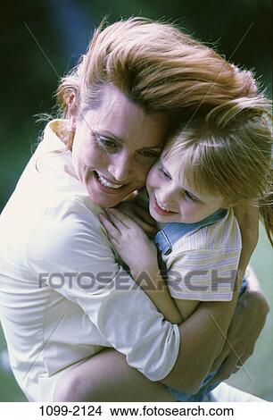 people, smiling, mother, windy, wind, hugging, joyous View Large Photo Image Picture - people, smiling, mother, windy, wind, hugging, joyous. Fotosearch