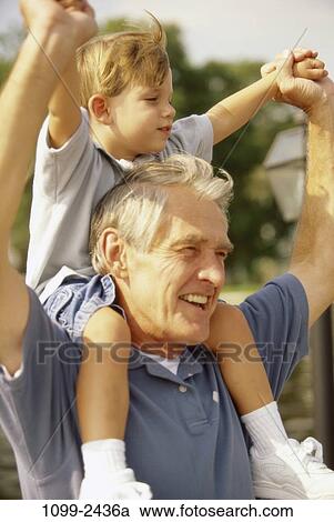 people, smiling, outdoors, carrying, smile, family, raising View Large Photo Image Stock Image - people, smiling, outdoors, carrying, smile, family, raising. Fotosearch