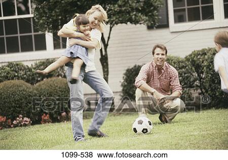 people, smiling, playing, ball, laughing, swinging View Large Photo Image Stock Photo - people, smiling, playing, ball, laughing, swinging. Fotosearch