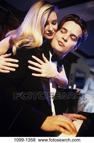 people, smiling, playing, couple, piano, romantic, hugging View Large Photo Image Stock Photo - people, smiling, playing, couple, piano, romantic, hugging. Fotosearch