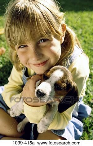 people, smiling, playing, dog, puppy, pet, holding View Large Photo Image Stock Image - people, smiling, playing, dog, puppy, pet, holding. Fotosearch