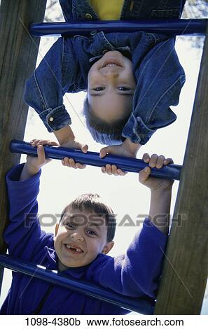 Stock Image - people, smiling, playing, holding, playground, outdoors, friends. Fotosearch